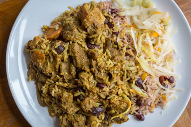 Jamaican curried goat with rice and peas