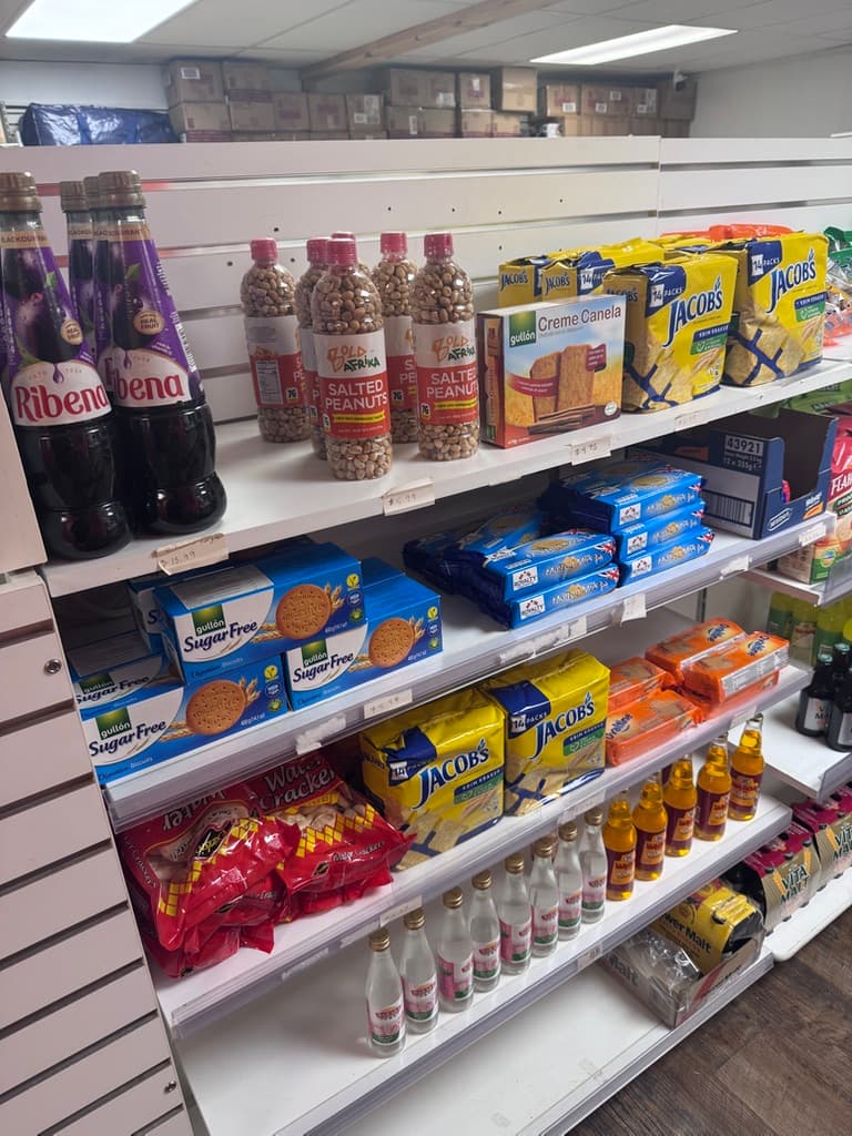 African and Caribbean snacks — Ribena, peanuts and biscuits