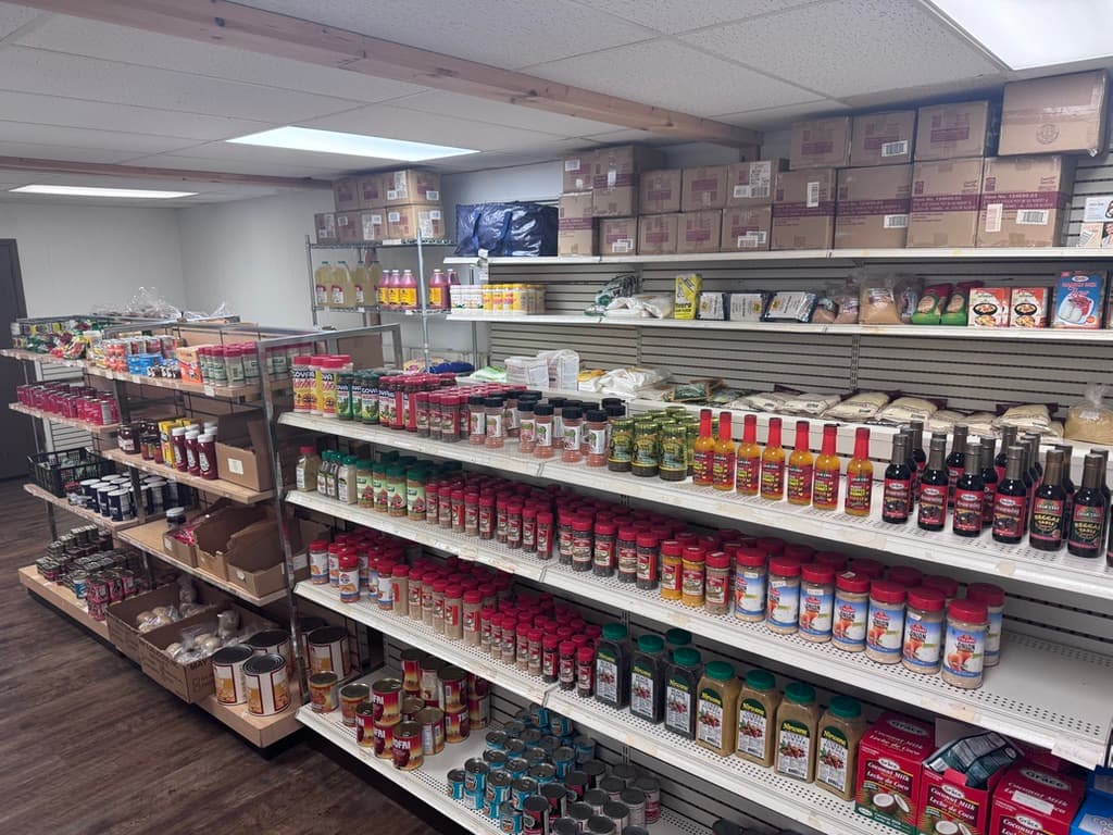Inside the African Caribbean Food Market in Morgantown — aisles stocked with spices, sauces and staples